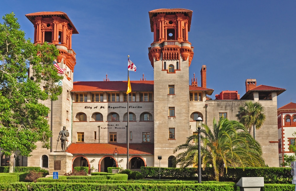 St. Augustine City Hall, a historic Spanish Renaissance-style building with two prominent towers and palm trees.